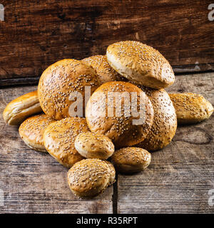 Hamburger bun on a wooden table Stock Photo