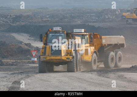 Articulated dumpers on the old Recycoal Coal Recycling Facility in Rossington,Doncaster which has now been demolished to make way for new houses. Stock Photo