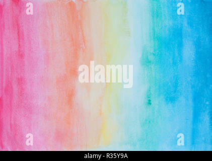 Abstract hand painted watercolor background in rainbow colors with watercolour stains and paper texture. Stock Photo