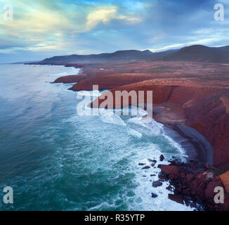 Aerial view on Legzira beach with arched rocks on the Atlantic coast at sunset in Morocco Stock Photo