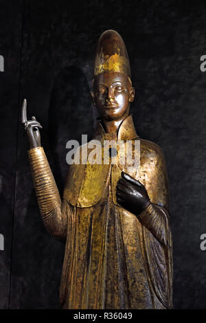 Boniface VIII Century XIV (1301 - 1301) by Manno Bandini from Siena 1287-1330 copper statue ( The Pope is represented in a hieratic way, with the tiara, in the act of apostolic blessing. ) Italy, Italian, Stock Photo
