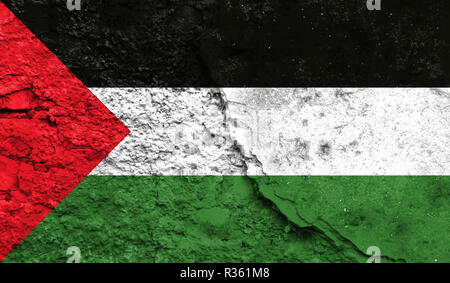 Flag of Palestine close up painted on a cracked wall, concept of armed actions and conflicts in the world Stock Photo