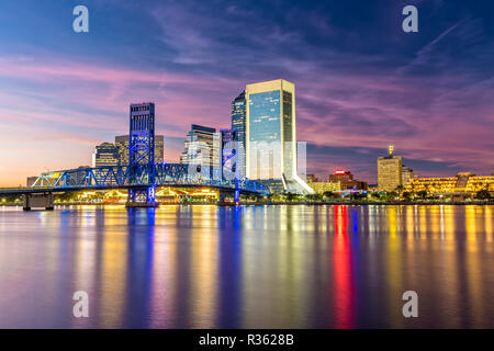 Skyline of Jacksonville, FL and Main Street Bridge at Dusk Stock Photo