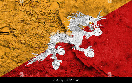 flag of Bhutan painted on cracked wall Stock Photo - Alamy
