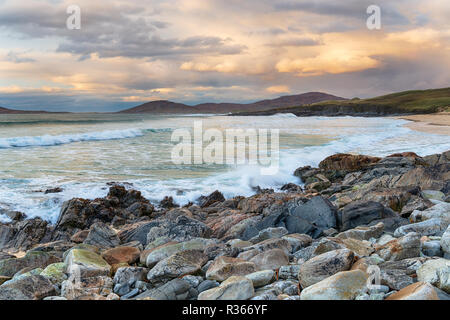 Moody sunset at Traigh Lar Beach on the Isle of Harris in the Western Isles of Scotland Stock Photo