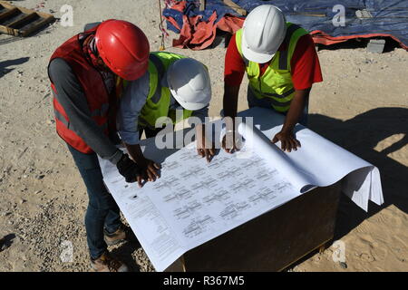 Skilled Engineers are doing daily Work Inspections to make sure the work has no problems Stock Photo