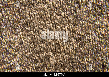 Brown knitted fabric textile texture close up Stock Photo