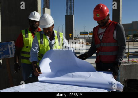 Skilled Engineers are doing daily Work Inspections to make sure the work has no problems Stock Photo
