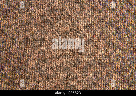 Brown knitted fabric textile texture close up Stock Photo