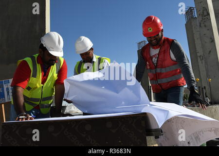 Skilled Engineers are doing daily Work Inspections to make sure the work has no problems Stock Photo