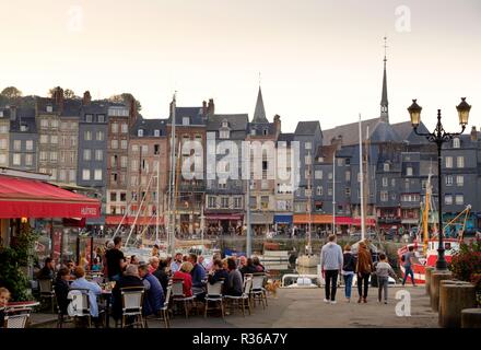 People enjoying French cafe on harbor, Honfleur, Normandy, France, Europe Stock Photo