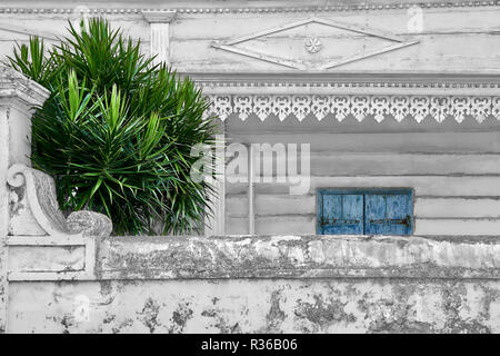 Traditional creole hut with white walls on the street on Saint Denis La Reunion Stock Photo