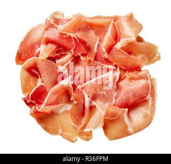 spanish dry-cured ham, jamon curado thinly sliced isolated on a white background, horizontal view from above, flat la Stock Photo