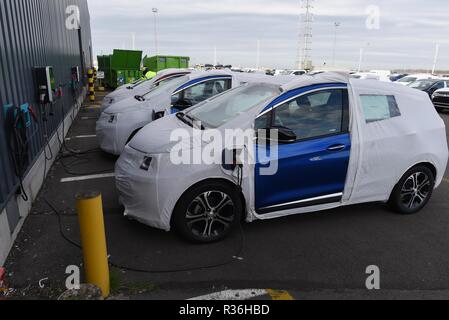 October 23, 2018 - Zeebrugge, Belgium: A brand-new Opel Ampera being charged in the port of Zeebrugge, the world's largest car terminal with 2.8 millions vehicles being freighted from here every year. The capacity to check, repair, customise, and charge cars directly from the port terminals is one of Zeebrugge's main competitive advantages. Some 900.000 cars are moved from and to the UK every year, and the port of Zeebrugge is preparing itself for a hard Brexit.  Des voitures electriques Opel Ampera sont reliees a des bornes de chargement dans le terminal d'ICO dans le port de Bruges-Zeebruges Stock Photo