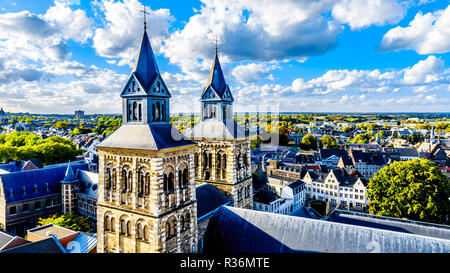 The historic city of Maastricht in the Netherlands as seen from the tower of the St John Cathedral. And the towers of the Basilica  of St Servatius Stock Photo