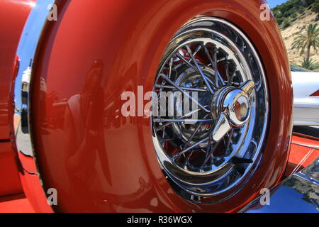 Close up shot of a spare tire on a red retro car Stock Photo
