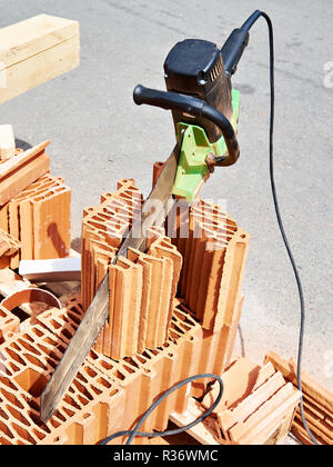 Electric saw for brick and concrete Stock Photo