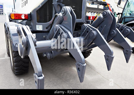 Ripper of motor grader in exhibition Stock Photo