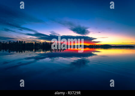 Colorful autumn sunset view from Sotkamo, Finland. Stock Photo