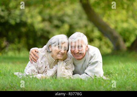 Portrait of cute elderly couple in nature Stock Photo
