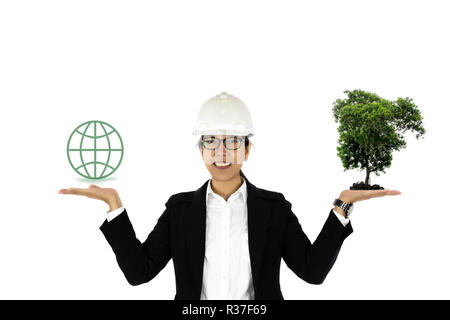 Enviroment concept woman construction hand holding tree and globe icon isolated. Stock Photo