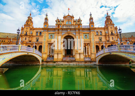 Seville, Spain - November 13, 2018: Plaza de Espana with unidentified people. It is a plaza in the Parque de Maria Luisa, built in 1928 for the Ibero- Stock Photo