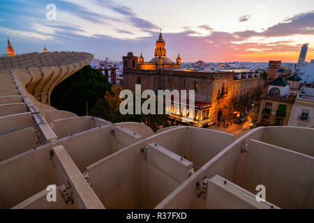 Seville, Spain - November 13, 2018: Metropol Parasol with unidentified people at night. It is a wooden structure designed by Juergen Mayer, with dimen Stock Photo