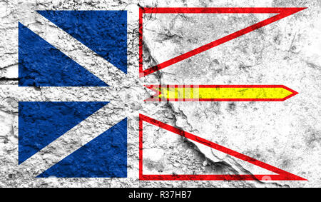 Flag of Newfoundland and Labrador close up painted on a cracked wall, concept of armed actions and conflicts in the world Stock Photo