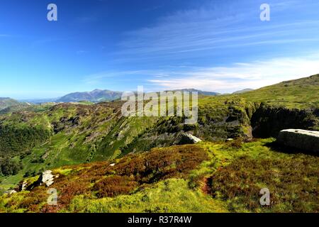 Skiddaw above the hills of Borrowdale Stock Photo