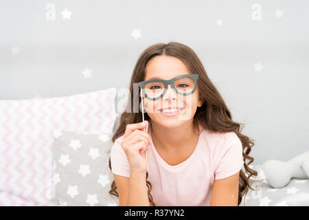 My glasses as unique as me. Happy child and childhood. Little girl hold fake glasses on face. Happy little girl. My childhood is a part of my story Stock Photo Alamy