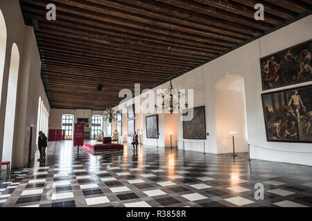 HELSINGØR, Denmark — The ballroom at Kronborg Castle, measuring 62 x 12 meters, was the largest royal hall in Northern Europe during its time. The walls feature a series of large paintings created between 1618 and 1631 for the great hall at Rosenborg Castle in Copenhagen. Stock Photo