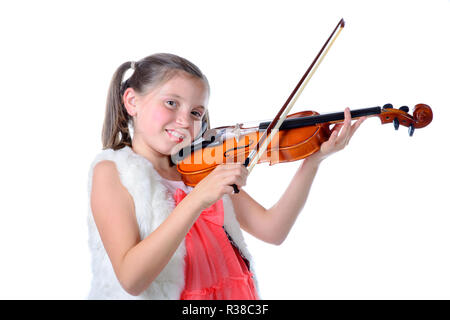 A smiling young girl plays the violin Stock Photo - Alamy
