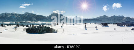 panoramic view to alps mountain range in Bavaria at winter Stock Photo