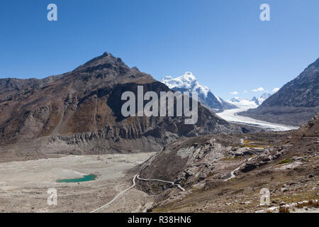 Landscape in the area of Drang-Drung Glacier and mountain pass Pensi La with visible road connecting Kargil and Padum, Jammu and Kashmir, India Stock Photo