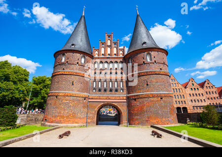 Holsten Gate or Holstein Tor or later Holstentor is a city gate and museum in the Lubeck old town in Germany Stock Photo