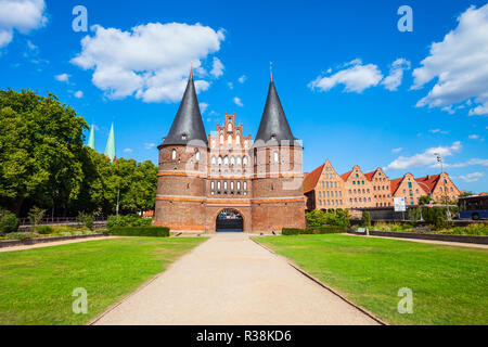 Holsten Gate or Holstein Tor or later Holstentor is a city gate and museum in the Lubeck old town in Germany Stock Photo