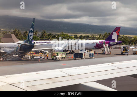 Kailua-Kona, Hawaii - Alaska Airlines and Hawaiian Airlines jet planes on the tarmac at Kona International Airport on Hawaii's Big Island. Stock Photo