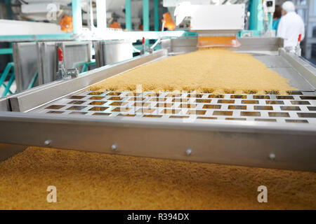 Macaroni Production in Food Factory Stock Photo