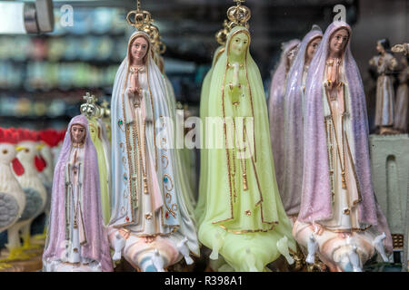 different souvenirs For Sale At Local Vendors in Alfama district, Lisbon, Portugal Stock Photo