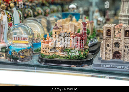 different souvenirs For Sale At Local Vendors in Alfama district, Lisbon, Portugal Stock Photo