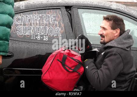 Butte, USA. 21st Nov, 2018. A resident prepares to leave a parking lot in Chico of Butte County, California, the United States, Nov. 21, 2018. Local officials warned that the rain after the wildfire could cause risk of flash floods and mudflows. Credit: Wu Xiaoling/Xinhua/Alamy Live News Stock Photo