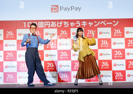 (L to R) Japanese actor Daisuke Miyagawa and singer Miki Fujimoto attend a news conference to announce the new smartphone payment service ''PayPay'' on November 22, 2018, Tokyo, Japan. PayPay is a smartphone payment service using barcodes (QR codes) supported by SoftBank, Yahoo Japan and Paytm, that can be used in Japanese stores including Bic Camera, Yamada Denki and Family Mart. Credit: Rodrigo Reyes Marin/AFLO/Alamy Live News Stock Photo