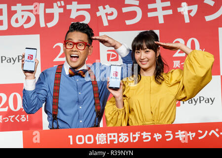 (L to R) Japanese actor Daisuke Miyagawa and singer Miki Fujimoto pose for the cameras during a news conference to announce the new smartphone payment service ''PayPay'' on November 22, 2018, Tokyo, Japan. PayPay is a smartphone payment service using barcodes (QR codes) supported by SoftBank, Yahoo Japan and Paytm, that can be used in Japanese stores including Bic Camera, Yamada Denki and Family Mart. Credit: Rodrigo Reyes Marin/AFLO/Alamy Live News Stock Photo