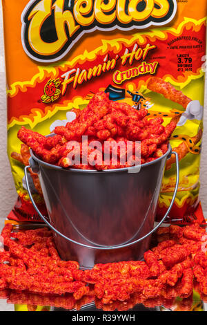 flamin' hot cheetos in bucket with bag Stock Photo - Alamy
