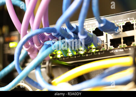 telephone and internet data communication cables, cabling and wires in a port. Infrastructure for communicating and systems in a modern office or work Stock Photo