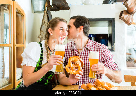 couple drinking wheat beer bavarian restaurant Stock Photo