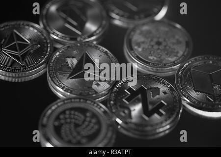 Cryptocurrency physical silver altcoins' close up in black and white Stock Photo