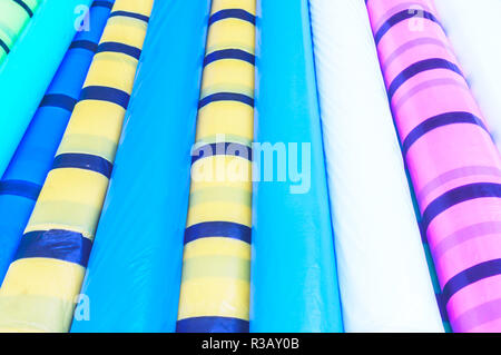 Smooth round shape roller of protective PVC sheet. Seamless colorful abstract pattern design of decorative element object. Backdrop background texture Stock Photo