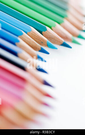 colored pencils wavy focus on blue soft Stock Photo