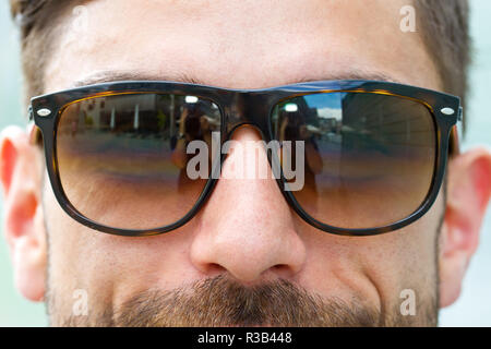 young,modern man in the sun Stock Photo